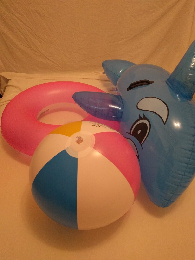Beach ball with swim ring and blue whale
