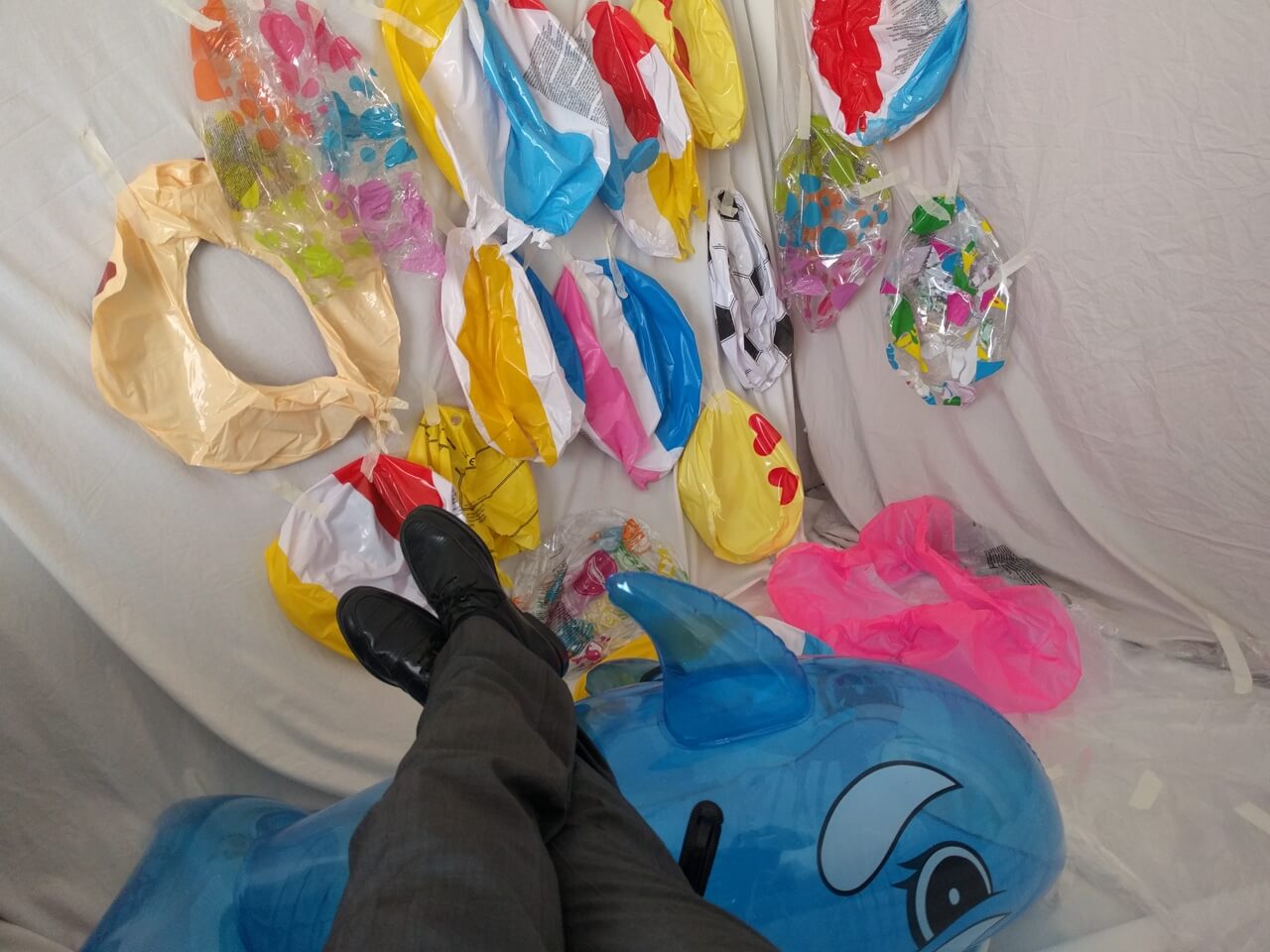 Popped beach balls on the wall