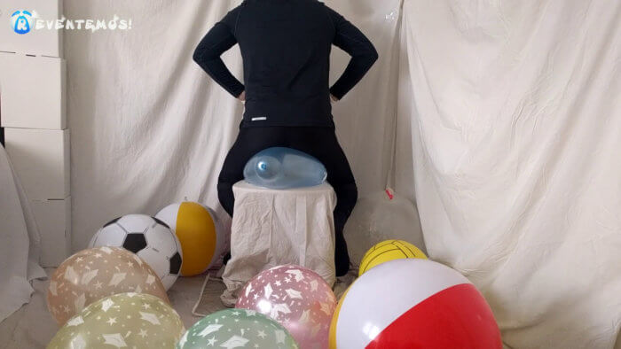 706 . Sit popping small balloons on a chair in leggings