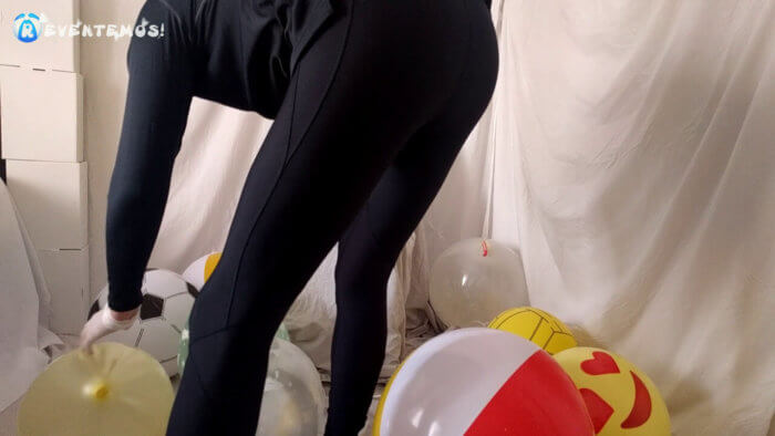 711 . Sit popping small balloons on a chair in leggings