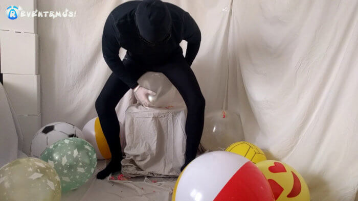 712 . Sit popping small balloons on a chair in leggings