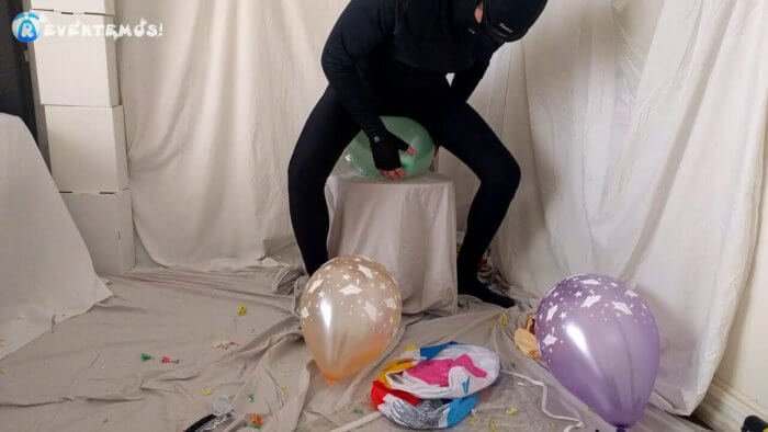718 . Sit popping small balloons on a chair in leggings