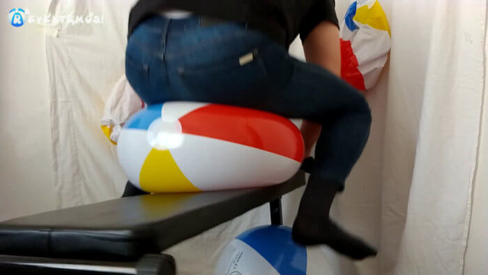 908. Sit popping and deflating beach balls on a workout bench