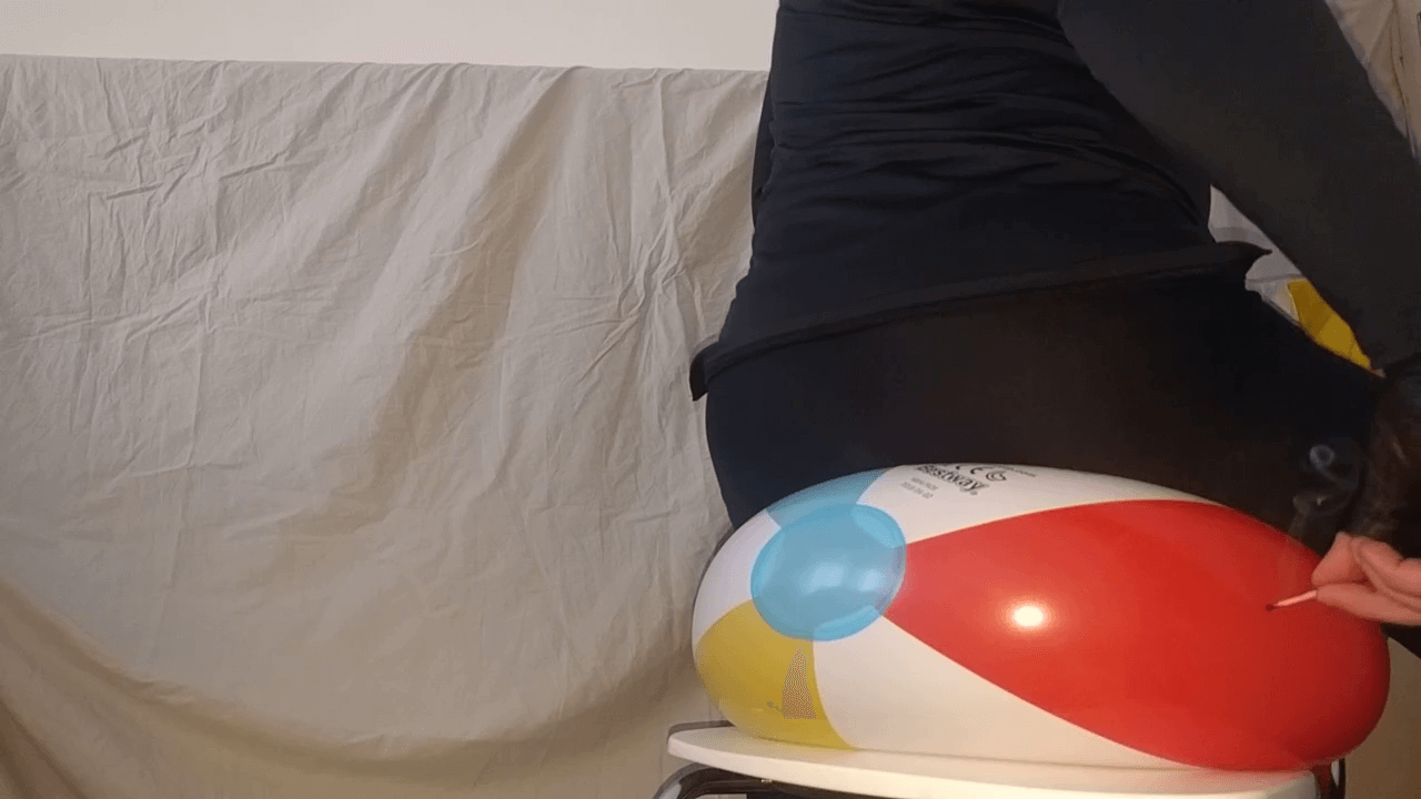 Burning a beach ball with a match