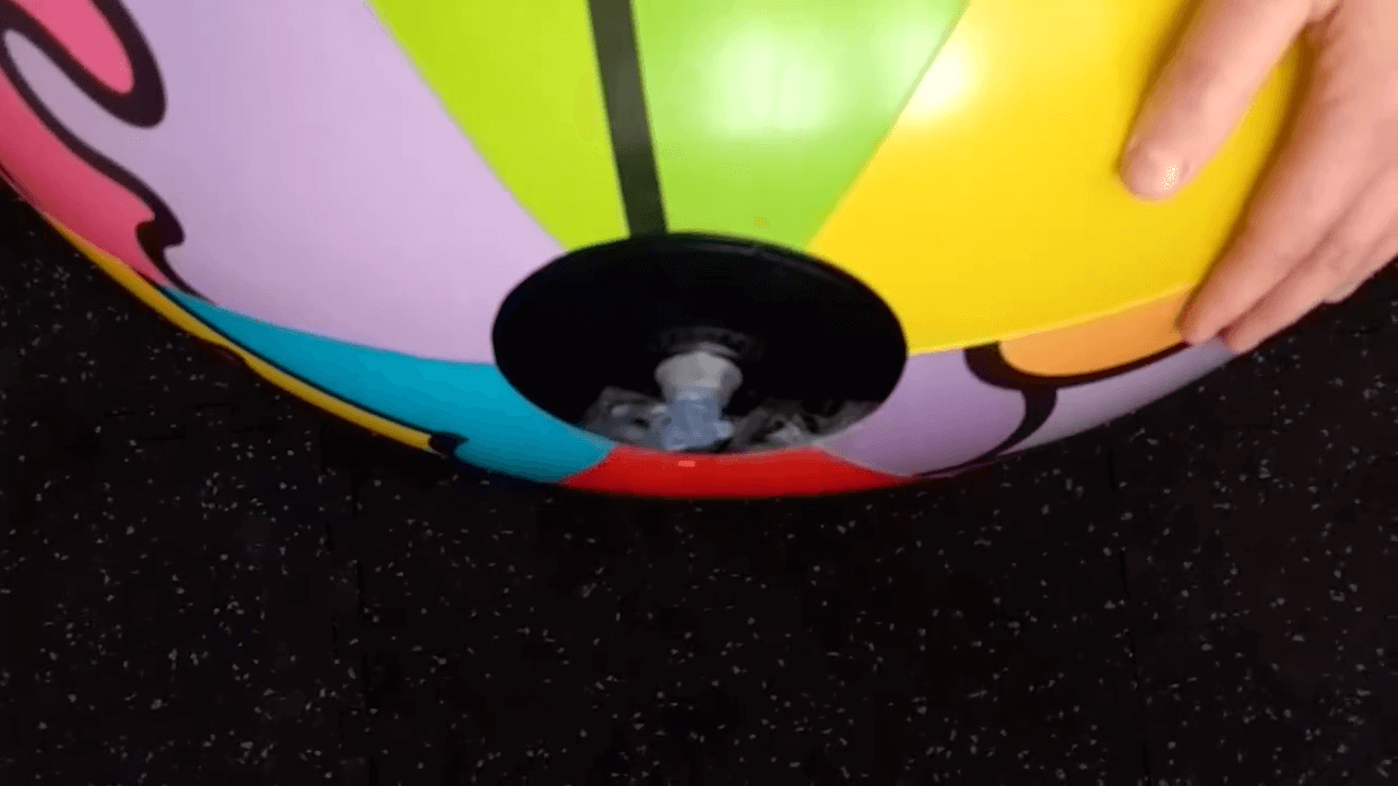 Deflating a leaked beach ball