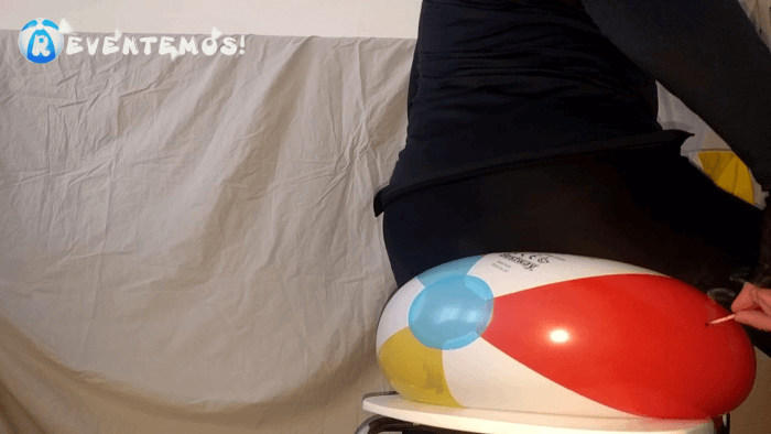 1207. Sit popping beach balls on the step floor and on a chair