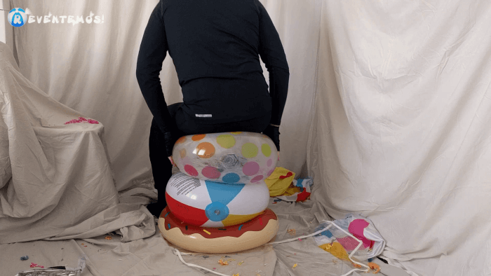 1401. Sit popping beach balls and swimrings on the floor