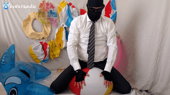 1412. Sit popping beach balls and swimrings on the floor