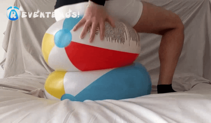 1503. Sit popping beach balls on the bed