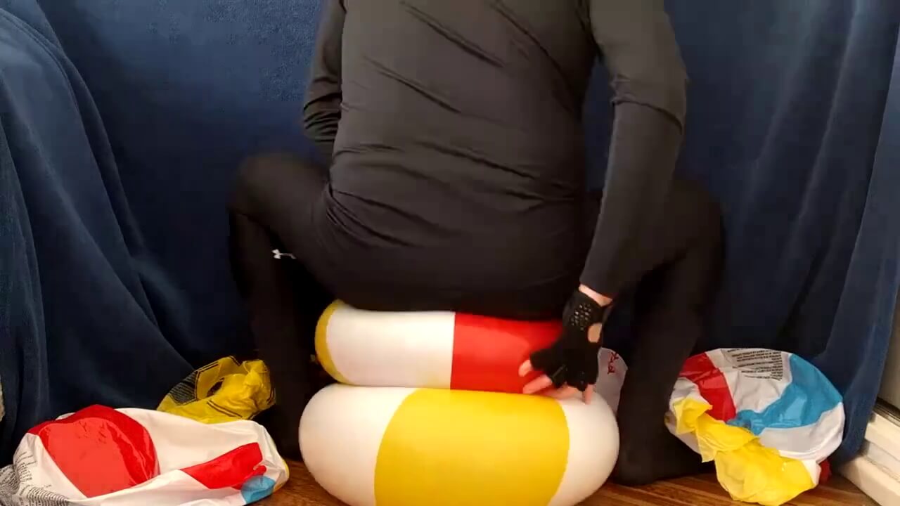 Popping beach balls on the floor. Not a good camera work though