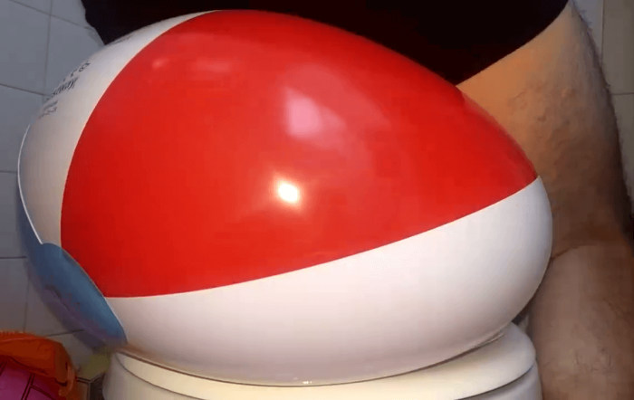 1903. Small beach balls popping in the bathroom