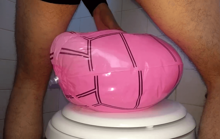 1906. Small beach balls popping in the bathroom