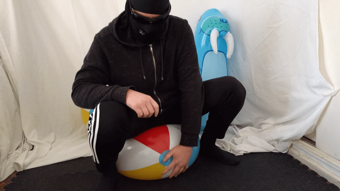 2003. Angry coach bursts student beach balls